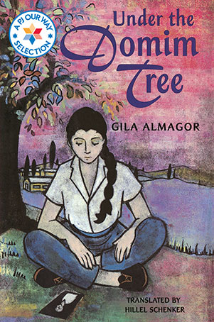 A girl sitting under a tree